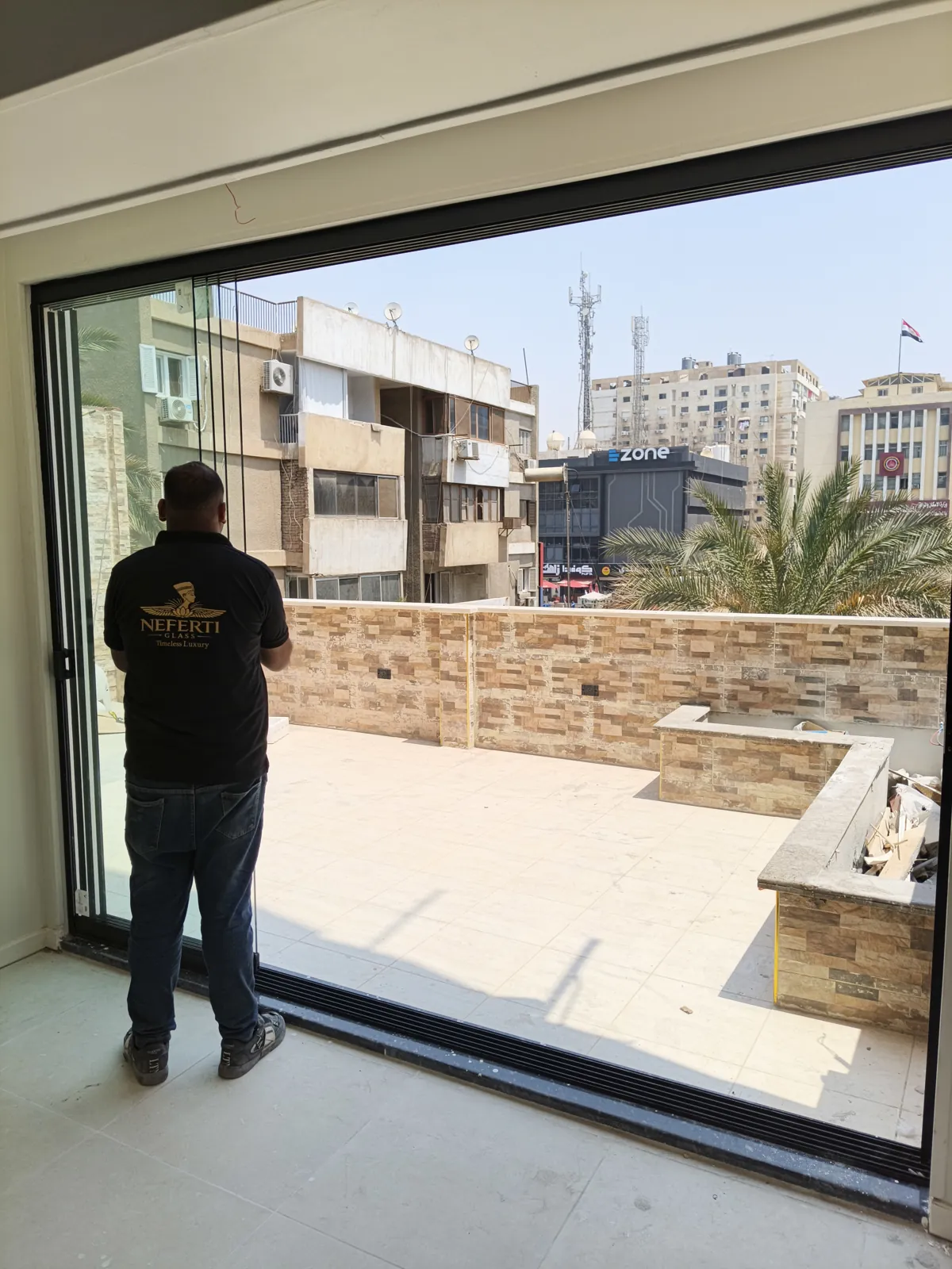 Neferti Glass installation team